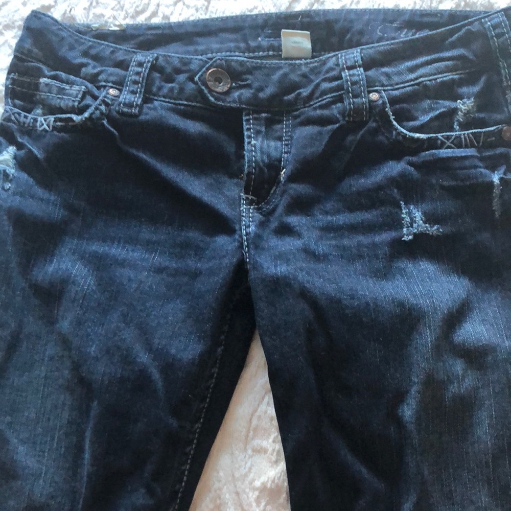 Silver ladies low rise jeans boot cut nice jean , comfy. Cute button up also